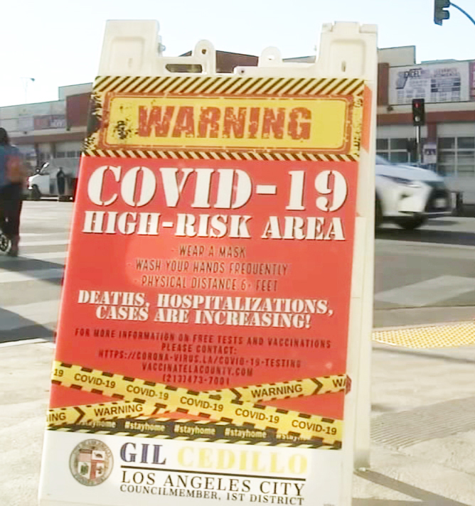 ▲ 코리아타운 지역에 설치된‘코로나-19 경고판’